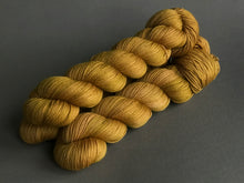 Load image into Gallery viewer, Oro.  Fingering 100% Merino SW (4320840679458)